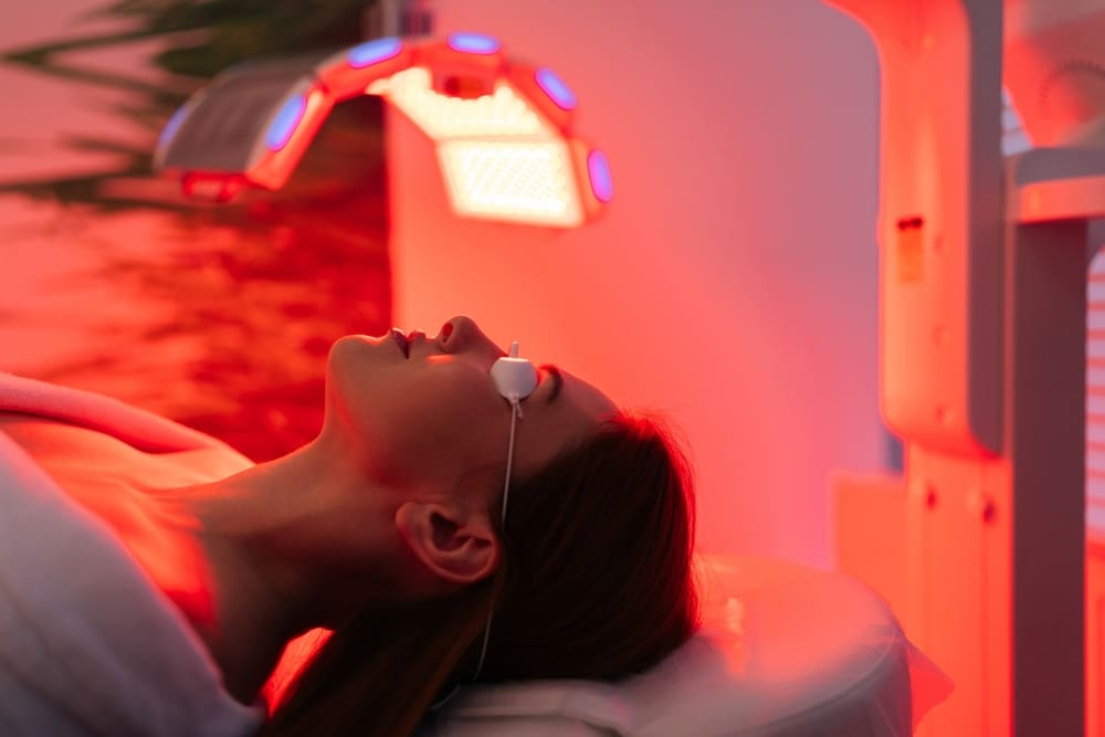 Closeup,Of,Female,Patient,Undergoes,Red,Led,Light,Or,Rlt Red Light Therapy in Wilmington, DE